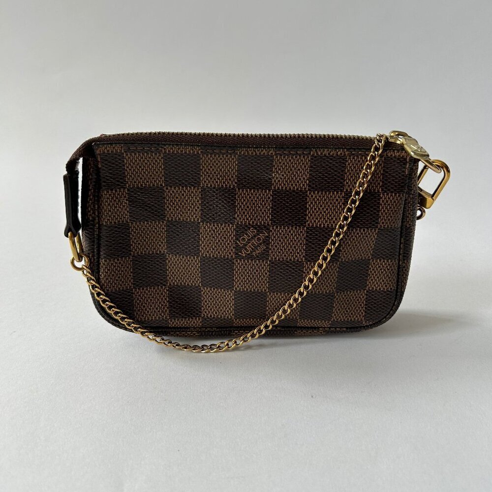 LOUIS VUITTON DAMIER EBENE MINI POCHETTE ACCESSOIRES